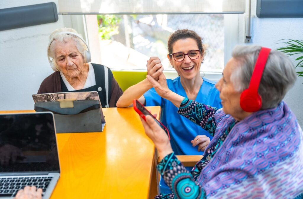 A nurse and a senior feel joy together during a music therapy session in memory care